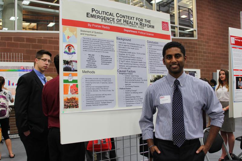 Photo of student presenting research