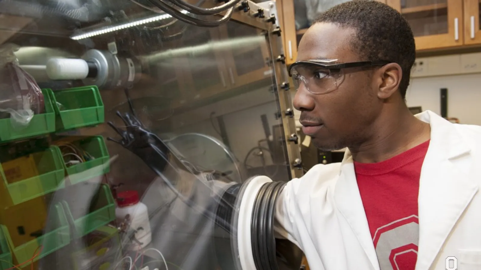 Student Using Robotic Arm to do research
