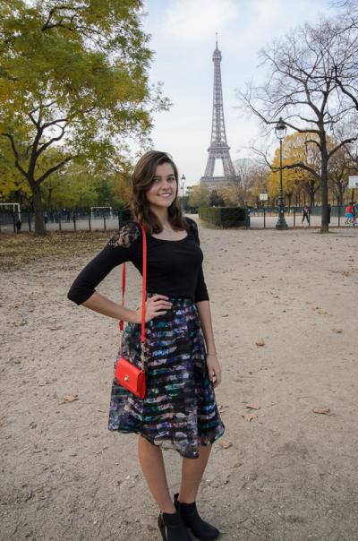 Photo of Marta Kosmyna in front of the Eiffel Tower