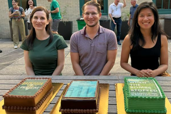 Book Authors in Front of their Respective Cakes